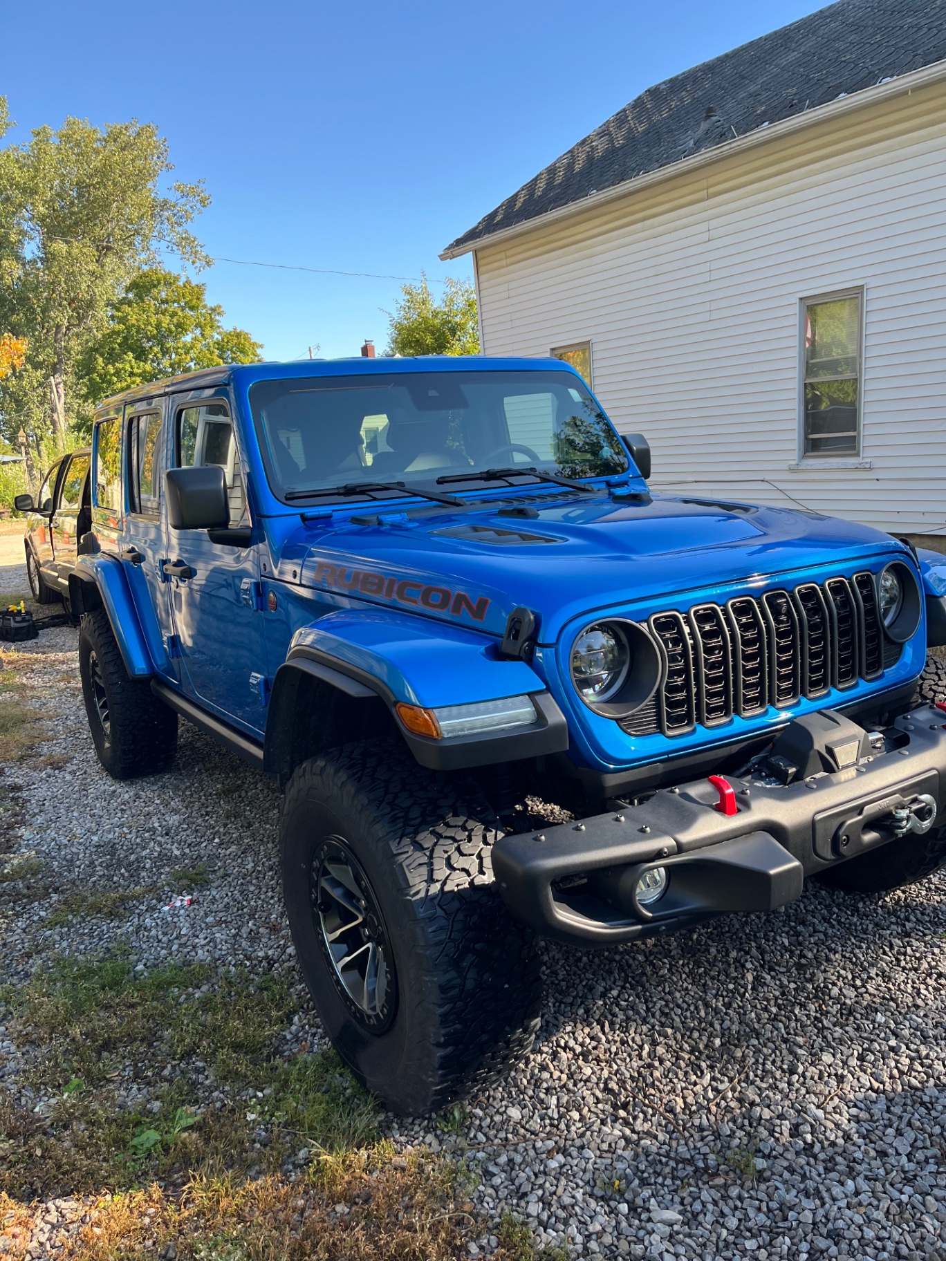Blue Jeep Rubicon finished by H&B Auto Detailing at the customer's location