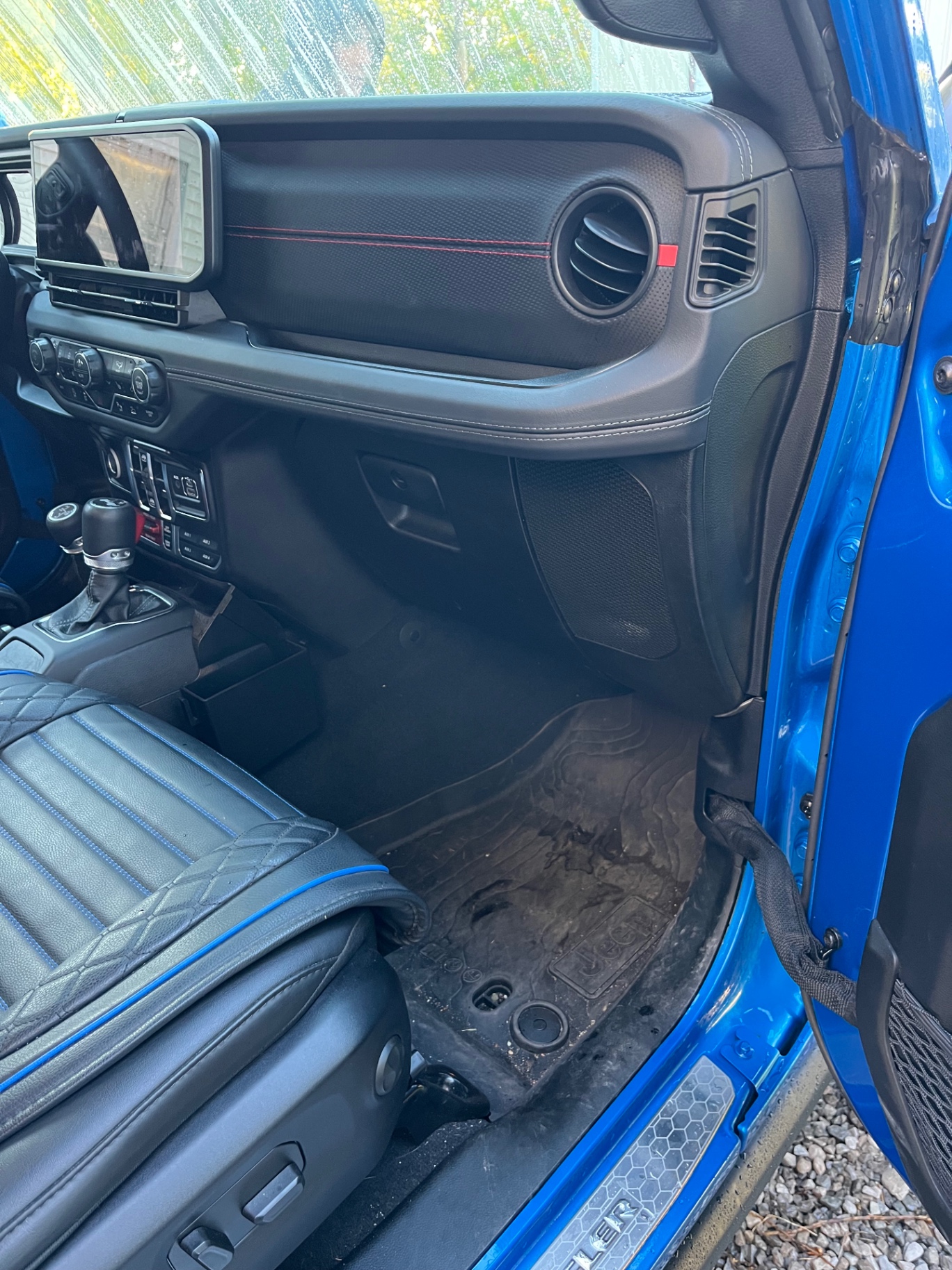 Jeep Rubicon passenger footwell — before