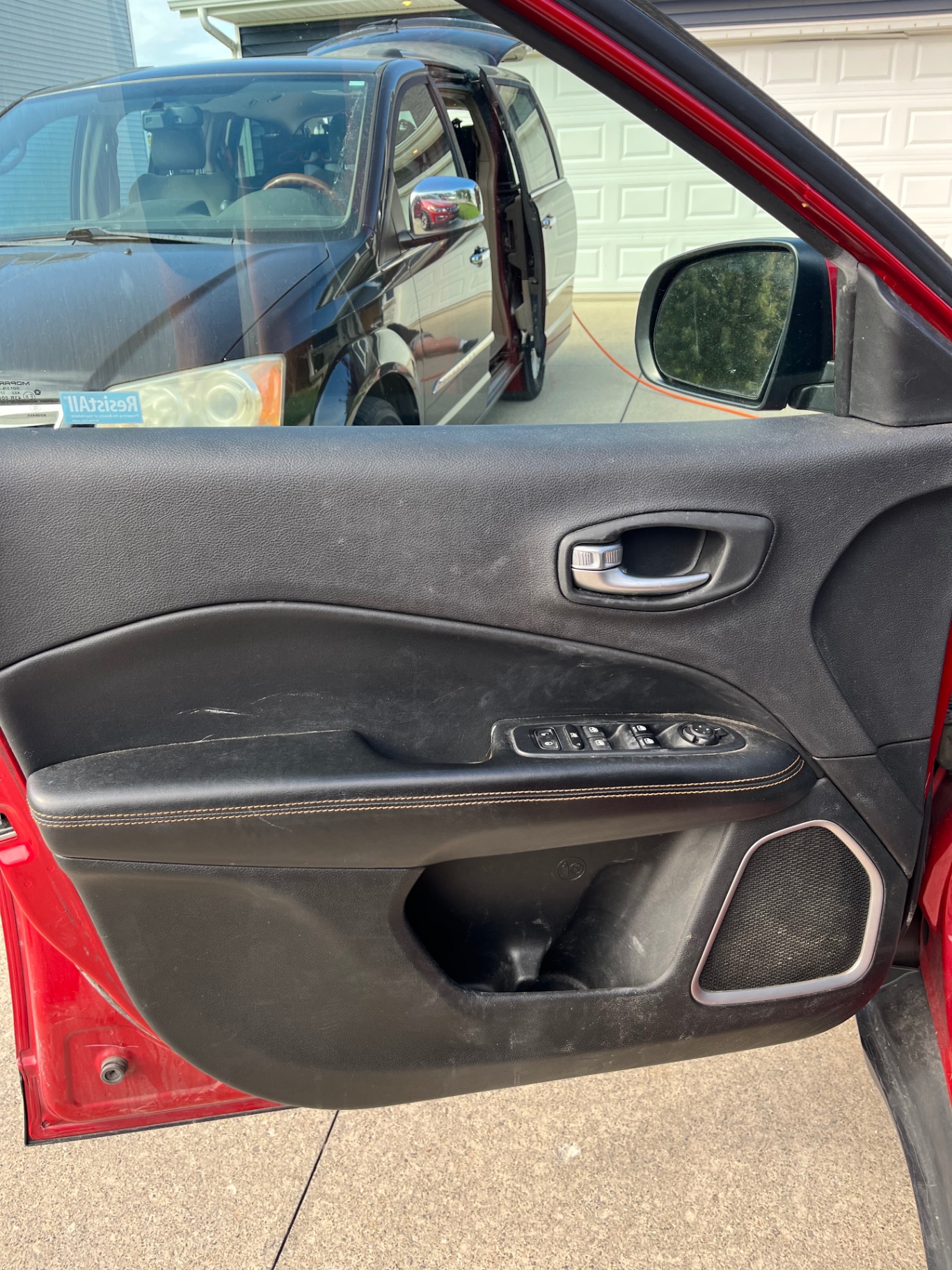 Jeep Compass driver door panel — before