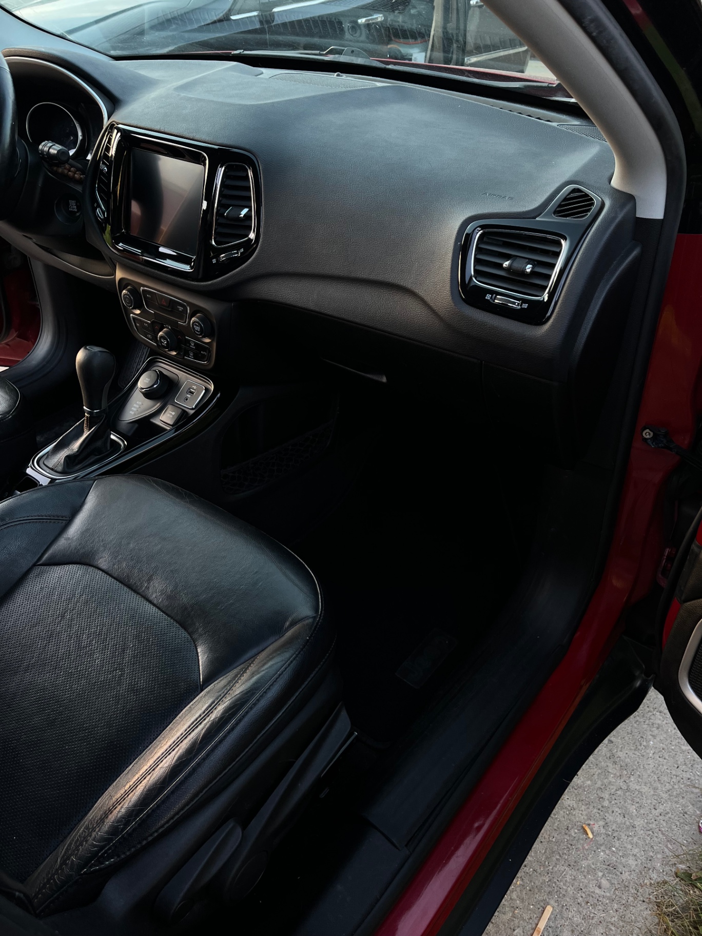 Jeep Compass dashboard and passenger footwell — after